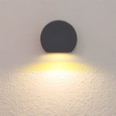 LED wall lamp designed as a metal sconce in sand black and grey, featuring aluminum and borosilicate glass components, styled in a minimalist aesthetic.