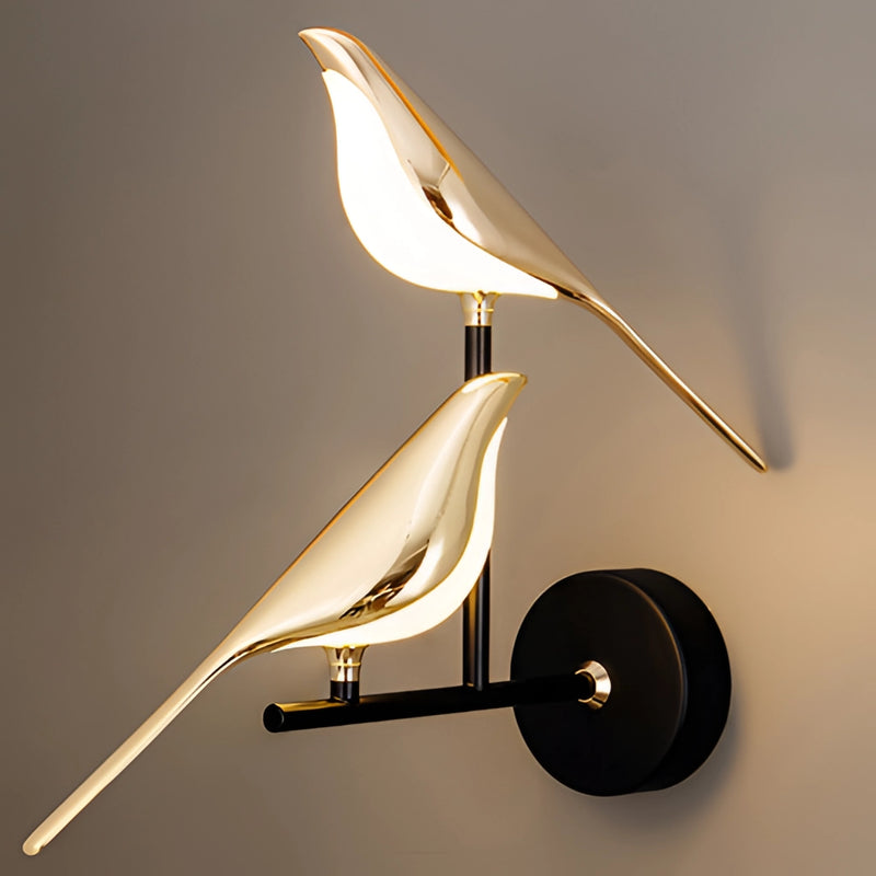 Gold modern rotatable wall sconce with a 360-degree lampshade, featuring a metal and wood design, mounted on a ceiling.