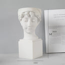 Medium-sized Neoclassical Greek head resin planter resembling a peasant, sculpted with artistic and detailed features, suitable for artistic and decorative purposes.