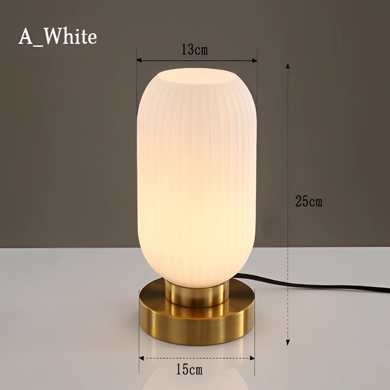Nordic Amber Table Lamp featuring a stained glass shade and a white cylindrical base, with an electric light fixture visible.