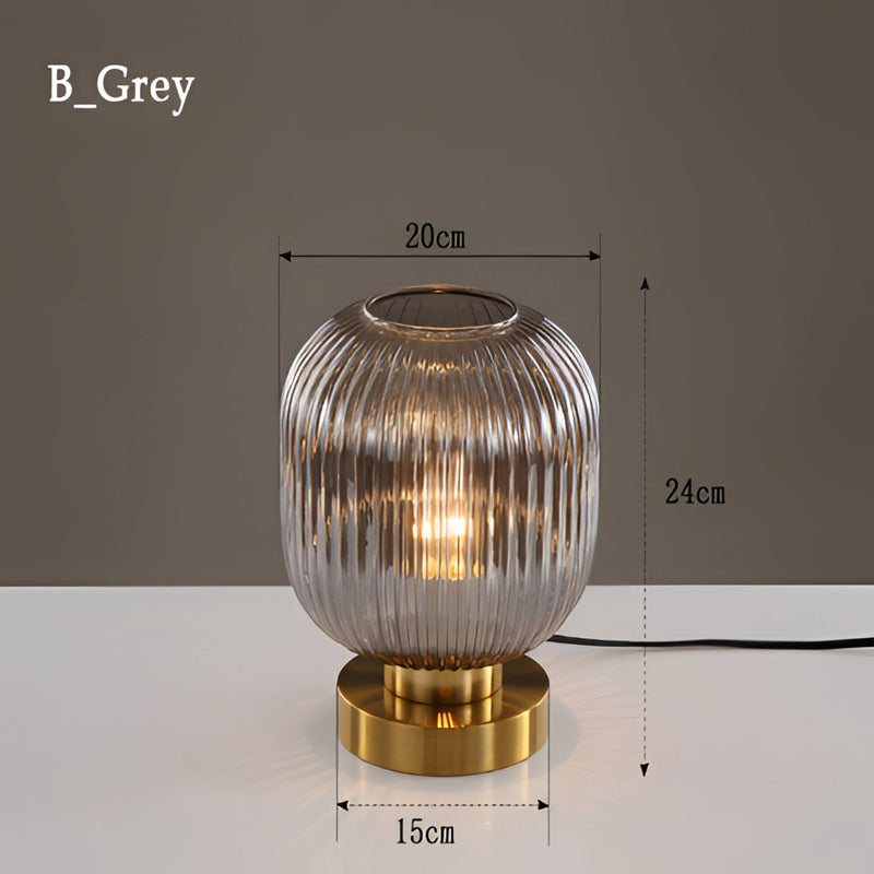Nordic Amber Table Lamp featuring a stained glass shade with gray accents, showcasing a blend of metal and glass materials.