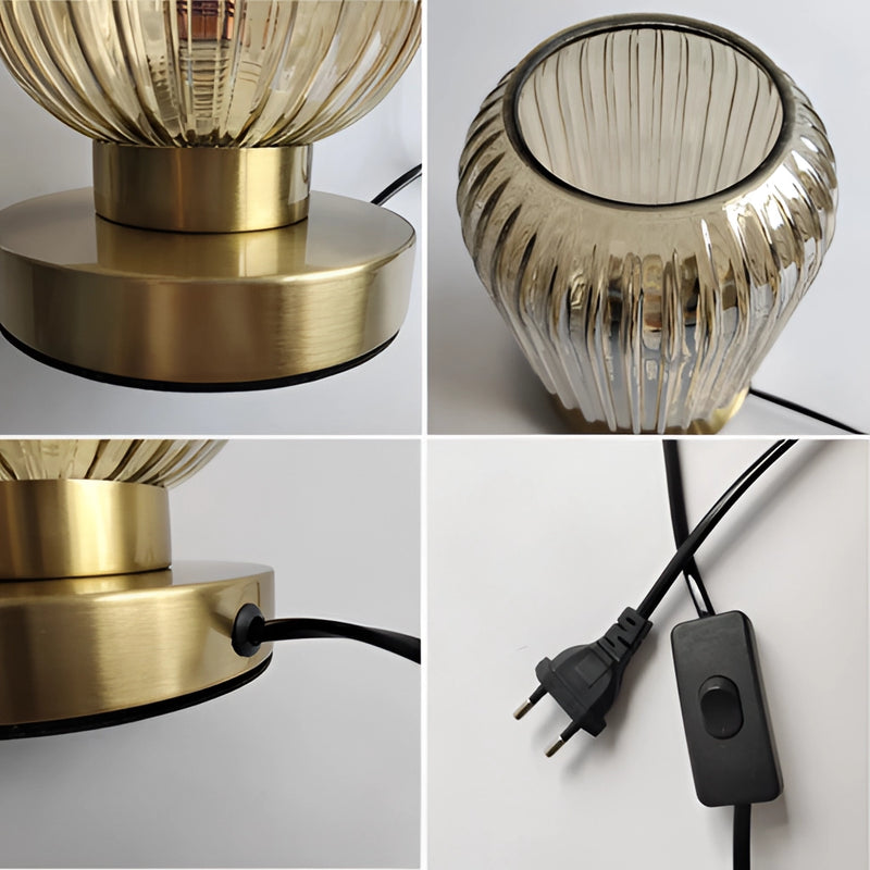 Nordic Amber Table Lamp featuring a stained glass shade, emphasizing its intricate metal design and soft, radiant light.