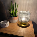 Nordic Amber Table Lamp featuring a stained glass shade, displayed on a wooden table alongside a houseplant in a flowerpot, with a focus on elegant interior design elements.