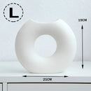 Large white Nordic style ceramic donut vase featuring a modern circular design, ideal for office and living room decor.