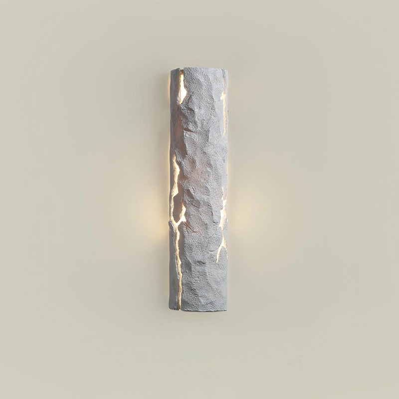 Outdoor wall light with IP65 waterproof rating, featuring a premium resin faux rock finish, in a rectangular shape with wood and metal accents, and electric blue tints.