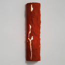 Outdoor wall light with IP65 waterproof rating featuring a premium resin faux rock finish, amber tinted glass, and a rectangular, cylindrical shape.