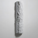 Outdoor wall light with IP65 waterproof rating, featuring a premium resin faux rock finish, designed in a rectangular shape with metal and glass accents, resembling a cylinder-like sculpture.