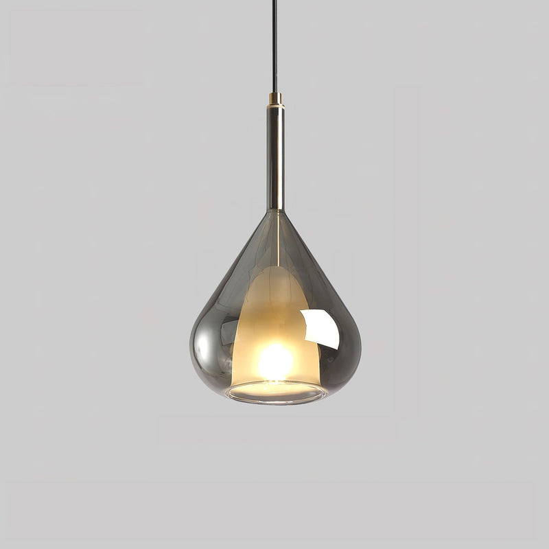 Smoke gray pendant lamp in a Nordic style featuring a clear raindrop design with a starlight effect, displayed over a wooden table.