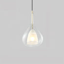 Nordic style pendant lamp featuring a clear, raindrop design with starlight effect, composed of composite materials and metal, showcasing a light bulb within a circular shape, suspended from a ceiling.