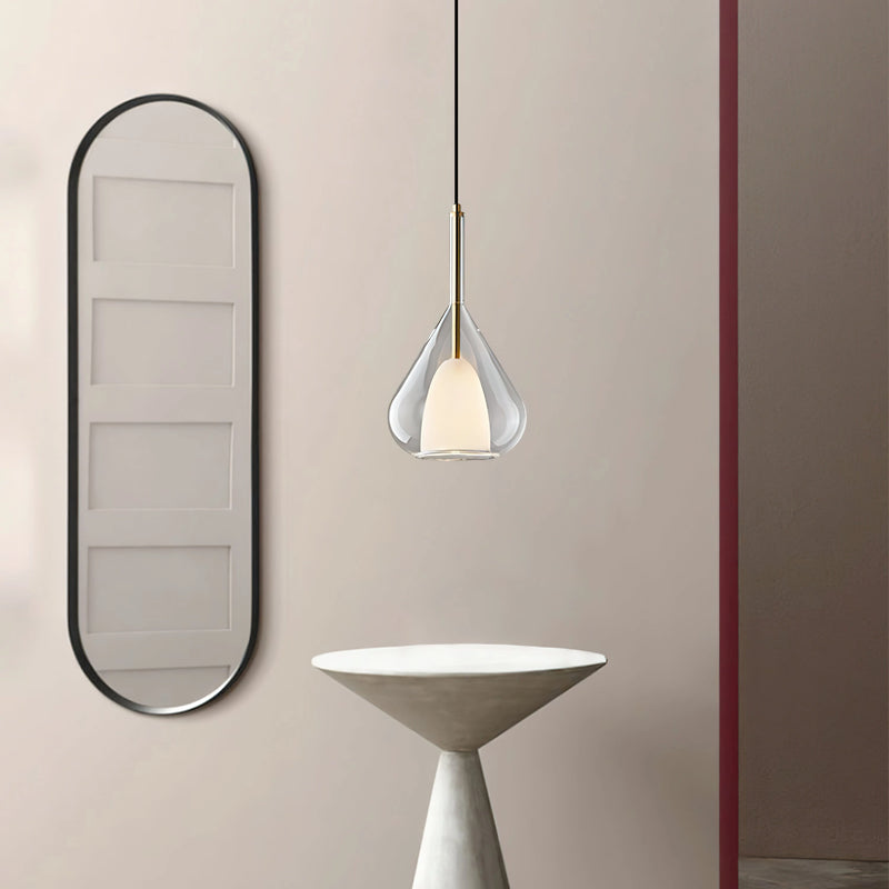 Nordic style pendant lamp featuring a clear raindrop design with a starlight effect, showcasing a metal ceiling fixture and circular elements.
