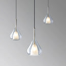 Nordic style pendant lamp featuring a clear raindrop design with starlight effect, made from glass and metal, hanging from a ceiling.