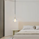 Nordic style pendant lamp featuring a clear raindrop design with a starlight effect, set against a grey interior with wooden elements.