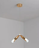 Modern Dante pendant lamp featuring a chandelier design with wooden and metal elements, suspended from a ceiling, incorporating shades and tints, and a decorative arthropod motif.
