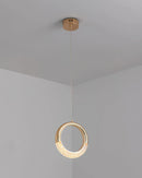 Modern Dante Pendant Lamp featuring a chandelier design with wood and metal materials, displayed against a beige plaster ceiling. The lamp has circular and oval shapes with shades of beige.