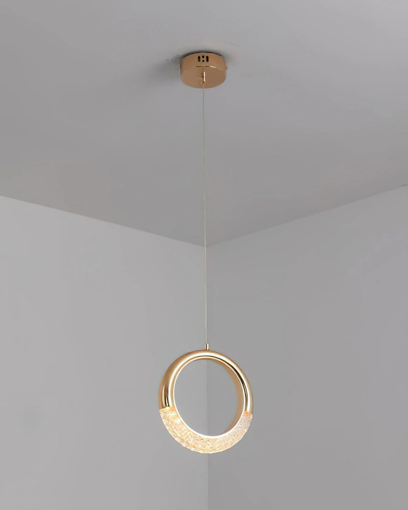 Modern Dante Pendant Lamp featuring a chandelier design with wood and metal materials, displayed against a beige plaster ceiling. The lamp has circular and oval shapes with shades of beige.