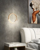 Modern Pendant Lamp Dante chandelier featuring a sleek design with black and white color scheme, highlighted in an interior setting with stylish furniture and subtle grey accents.