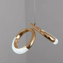 Modern Pendant Lamp Dante featuring a chandelier design with gold and silver elements, oval and circular shapes, combined with wooden accents in a rectangular form.