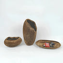 Decorative bowl crafted from resin with a nature-inspired design, featuring wood-like textures and metallic accents.