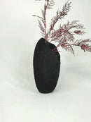Nature-inspired resin decorative bowl featuring elements like branches, twigs, and a design resembling tree ornaments and holiday decorations.