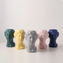 Resin Neoclassical Venus vase sculpture in blush pink, teal, and grey options, featuring detailed artistic and collectible ceramic design.