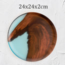 Handcrafted epoxy resin and wood tray, circular shape, featuring natural wood patterns and translucent resin, 24cm in diameter.