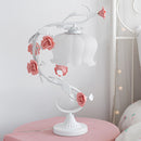 White Rose Encased Table Lamp featuring elegant floral lighting with artificial pink petals and artful design elements.