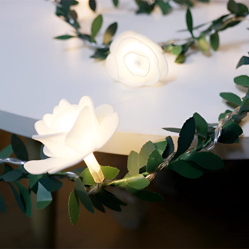 Battery-operated LED garland featuring artificial roses and twigs, designed for flower arranging and decoration.