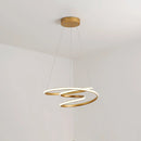 Elegant spiral pendant light made of aluminum with a modern design, hanging from a ceiling and providing warm illumination.