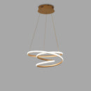 Gold spiral pendant light featuring a modern, elegant design in aluminum, suspended from the ceiling, emitting a cool light, dimensions ∅ 19.7″ x H 19.7″.