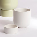 Ceramic flower pot styled as stacked coffee cups on a table, ideal for garden and bonsai use.