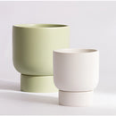 Ceramic vase designed as stacked flower pots, suitable for garden and bonsai decoration, displayed on a table.