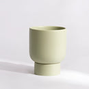 Pale green, small stacked ceramic flower pot for garden and bonsai displayed on a table.