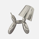 Silver table lamp featuring a touch-sensitive, dimmable crystal design shaped like a balloon dog, displayed on a table.