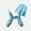 Aqua-colored table lamp featuring a touch-sensitive, dimmable crystal base with a playful balloon dog design, showcased on a table.