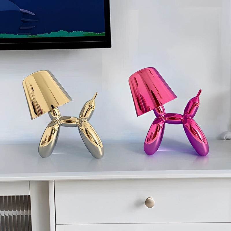 Purple table lamp featuring a crystal touch-sensitive base and a dimmable balloon dog design, positioned on a wooden surface.
