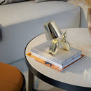 Dimmable crystal table lamp featuring a unique balloon dog design, placed on a desk.