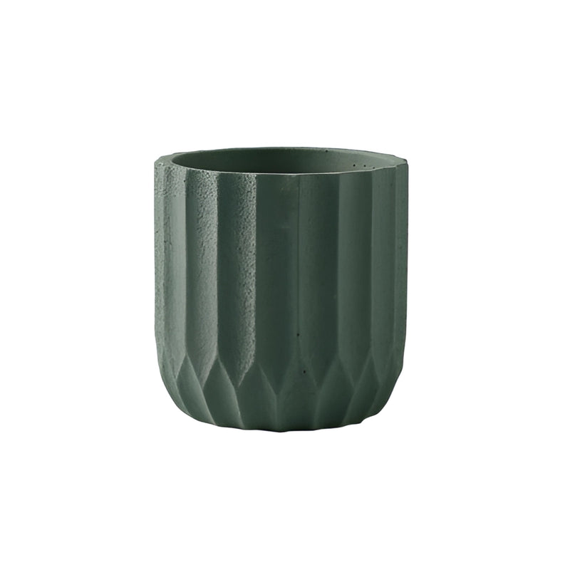 Large jade-colored textured ceramic polygon vase with a geometric design displayed on a wooden surface.
