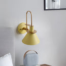 Elegant retro design wall light with a matt finish, featuring a metal and wood composition, mounted on a room wall, enhancing the interior design.