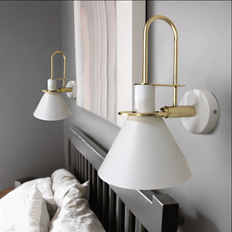 Elegant retro design wall light with a matt finish, featuring a sconce style lamp mounted on a wooden shelving unit, complemented by plants and linens.