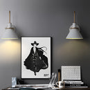 Elegant retro design wall light with a matte finish, featuring a grey lamp mounted on a wall, complemented by subtle picture frame and linear elements in an interior setting.