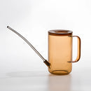 Brown watering can with extended spout for accurate water delivery, mistakenly labeled as various drinkware items.