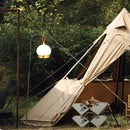 Cordless Waterproof LED Lamp Blimp designed as a nightstand table light, displayed outdoors among trees and plants.