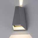 Outdoor pyramid-shaped LED wall sconce with a metallic finish and rectangular lampshade, mounted on a ceiling, emitting a soft glow.