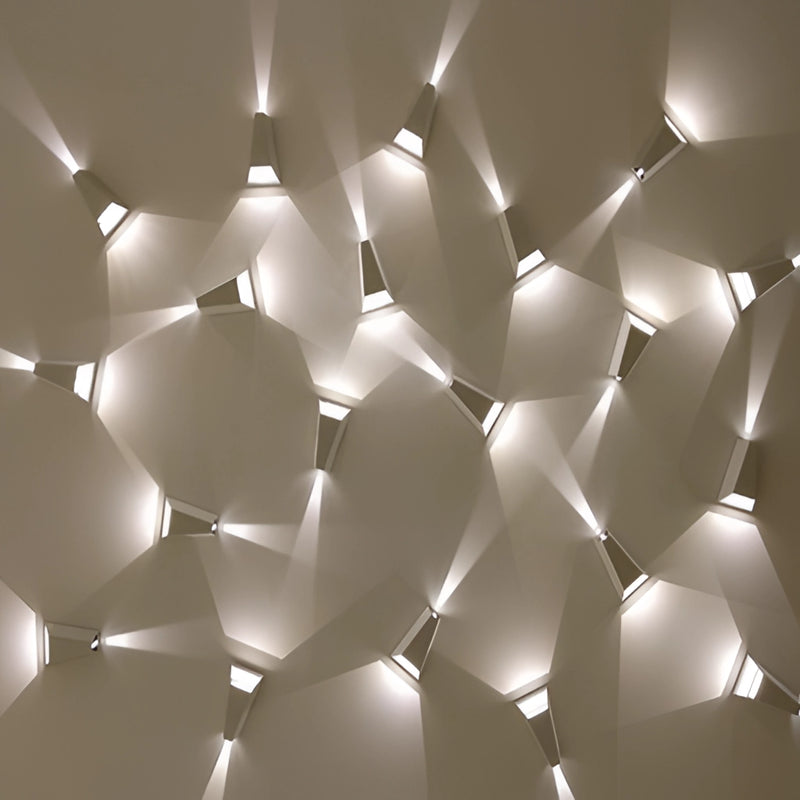 Modern waterproof outdoor pyramid LED wall sconce featuring a triangular design with symmetrical patterns and a sleek, dark finish.