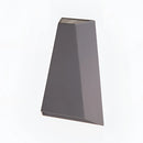 Gray waterproof outdoor pyramid LED wall sconce with a warm white light mounted on a wooden wall.