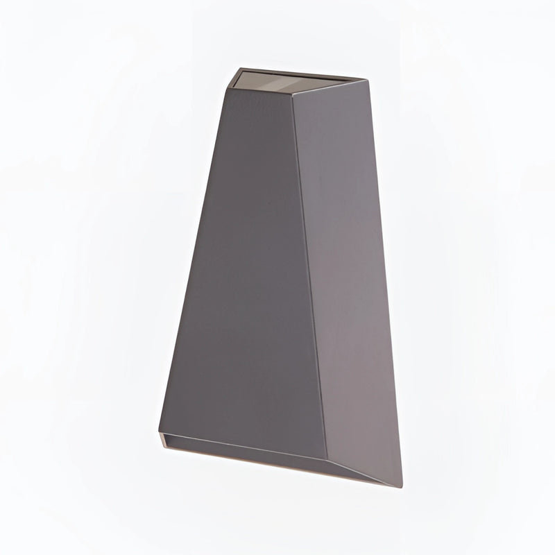 Gray waterproof outdoor pyramid LED wall sconce with a warm white light mounted on a wooden wall.