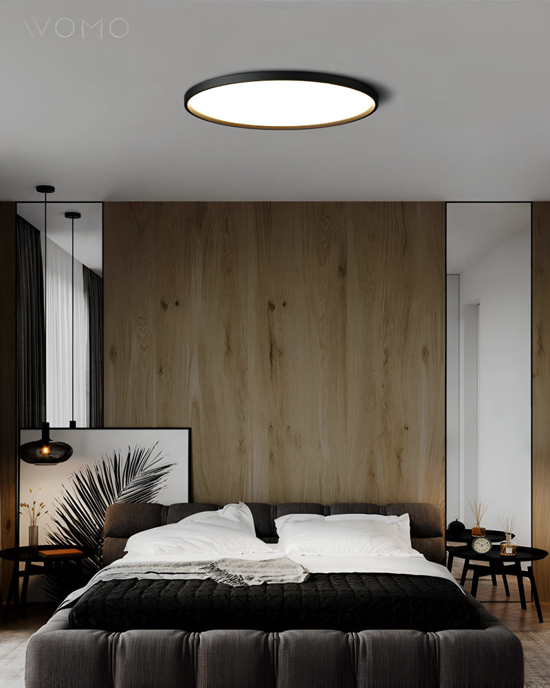 Circular LED Ceiling Light with Black Rim, Minimalist Design, Energy-Efficient, Mounted on Ceiling in Modern Interior
