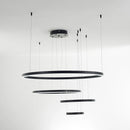 Circular LED pendant light with gold finish and adjustable height, shown in a modern setting, emphasizing its sleek and symmetrical design.