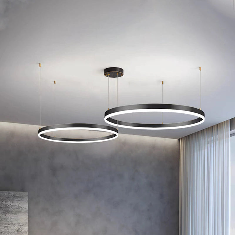 Circular LED pendant light with gold finish, adjustable height chandelier, featuring two black dimmable rings in 60cm and 80cm sizes, suspended from the ceiling.