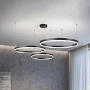 Circular LED Pendant Light with Gold Finish and Adjustable Height, featuring three black dimmable rings in 20cm, 40cm, and 80cm sizes, suspended from the ceiling.